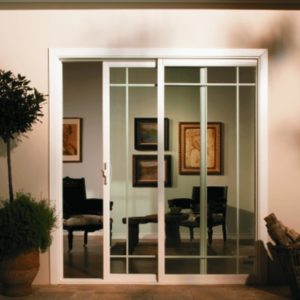 Sliding glass doors with white frames open into a home