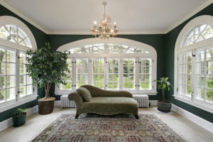 Windows installed in a Luxurious Sunroom with sofa and lights