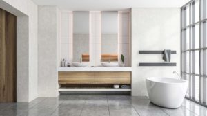 A luxurious, modern bathroom with a freestanding bathtub and elegant fixtures