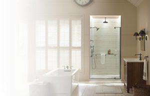 A remodel bathroom having showers in it.